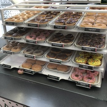Krispy Kreme - a variety of donuts on display - Donuts Near Me - Atlanta, Georgia