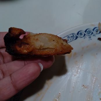 Smokey Bones Lithonia - Top portion of burnt, soggy potato wedge. - Barbeque Near Me - Lithonia, Georgia