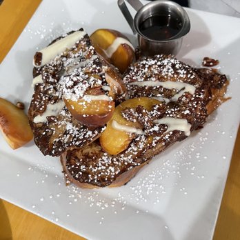 Fat Milo's All Day Cafe - Fancy Waffles. (Seasonal special) fresh local peaches, candied pecans on thick French toast - American Near Me - Sherwood, Oregon Fat Milo's All Day Cafe - Fancy Waffles. (Seasonal special) fresh local peaches, candied pecans on thick French toast - American Near Me - Sherwood, Oregon