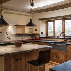House of Whitley - 50 Million Year Old Fossils Fill this Kitchen with History & Nature all in one.