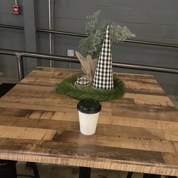 West Native Coffee - a coffee cup on a wooden table - Coffee & Tea Near Me West Native Coffee - a coffee cup on a wooden table - Coffee & Tea Near Me