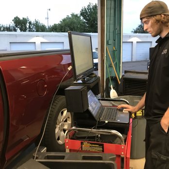 Elevated Audio - Brett working on tuning a DSP in a Dodge Ram. - Car Stereo Installation Near Me