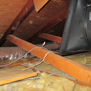 All-Tech Roofing - Partial picture of whole-house fan in attic. - Roofing Near Me