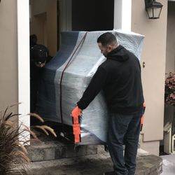 Moving an upright wall piano in pebble Beach