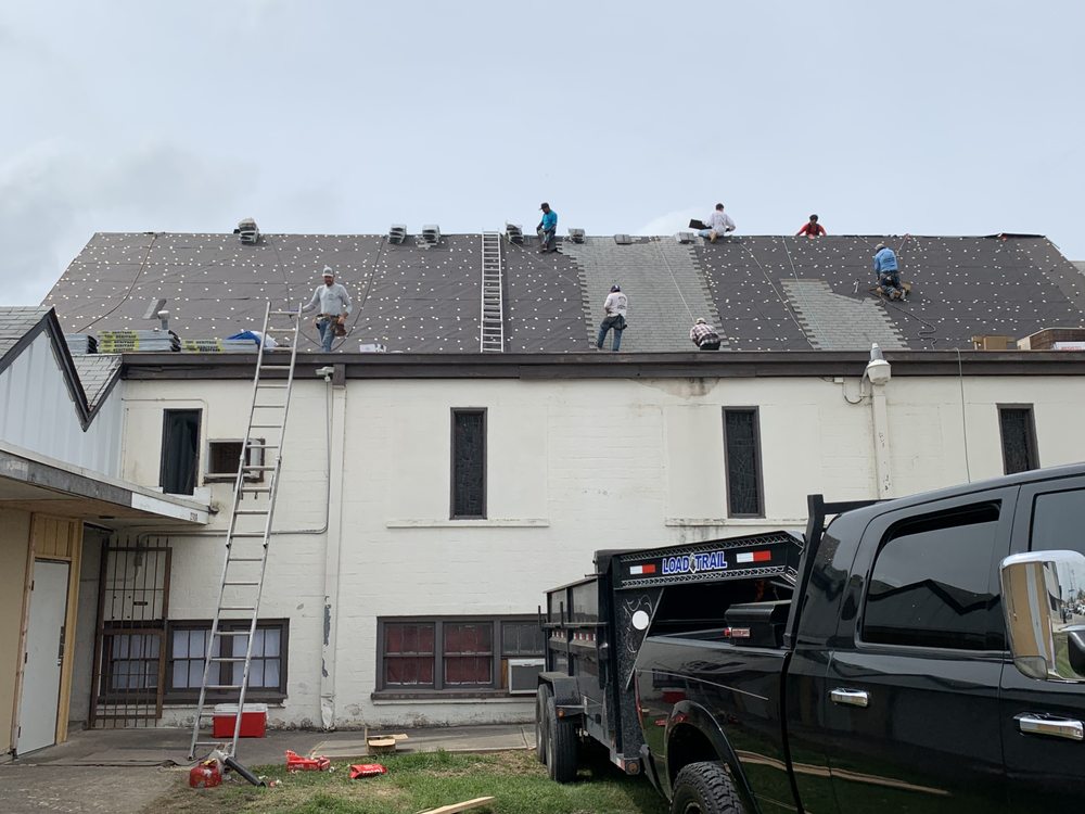Slide of Trinity Roofing & Restoration