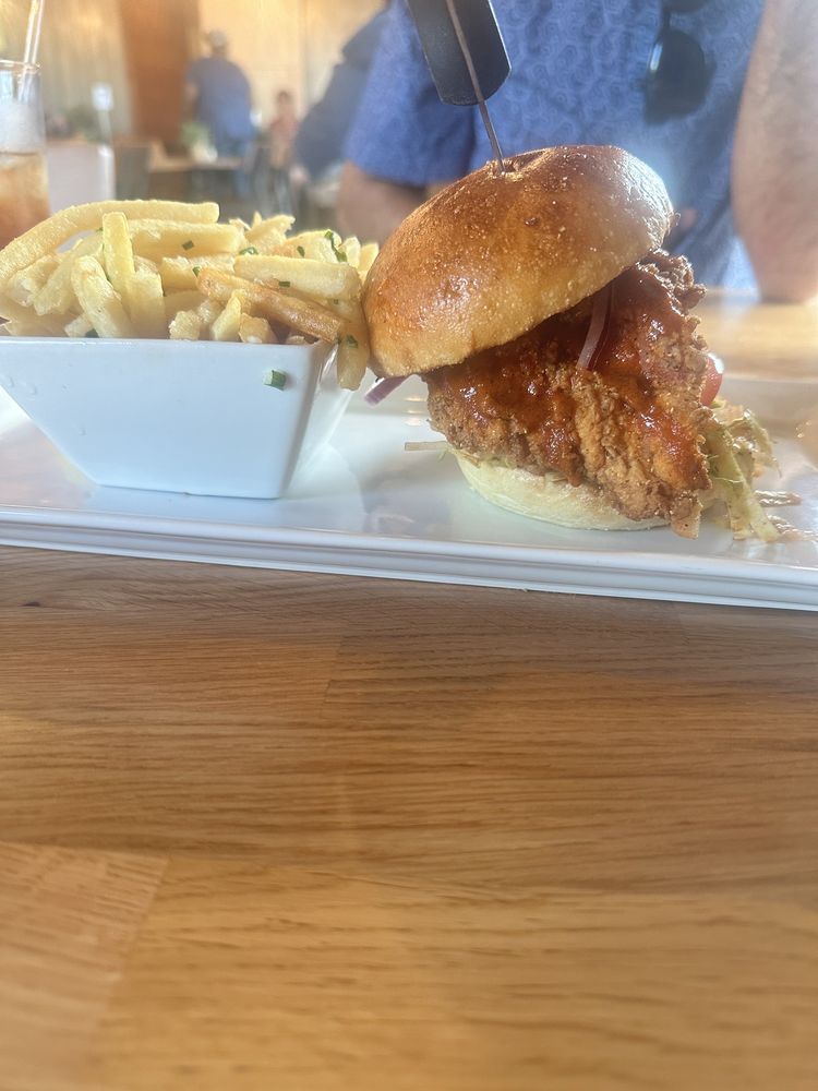 Spicy chicken sandwich and garlic fries Yelp