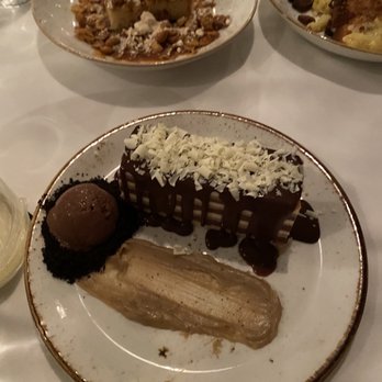 Voyagers - Eight layer chocolate cake....a must for chocolate lovers. - Seafood Near Me - Orange Beach, Alabama Voyagers - Eight layer chocolate cake....a must for chocolate lovers. - Seafood Near Me - Orange Beach, Alabama