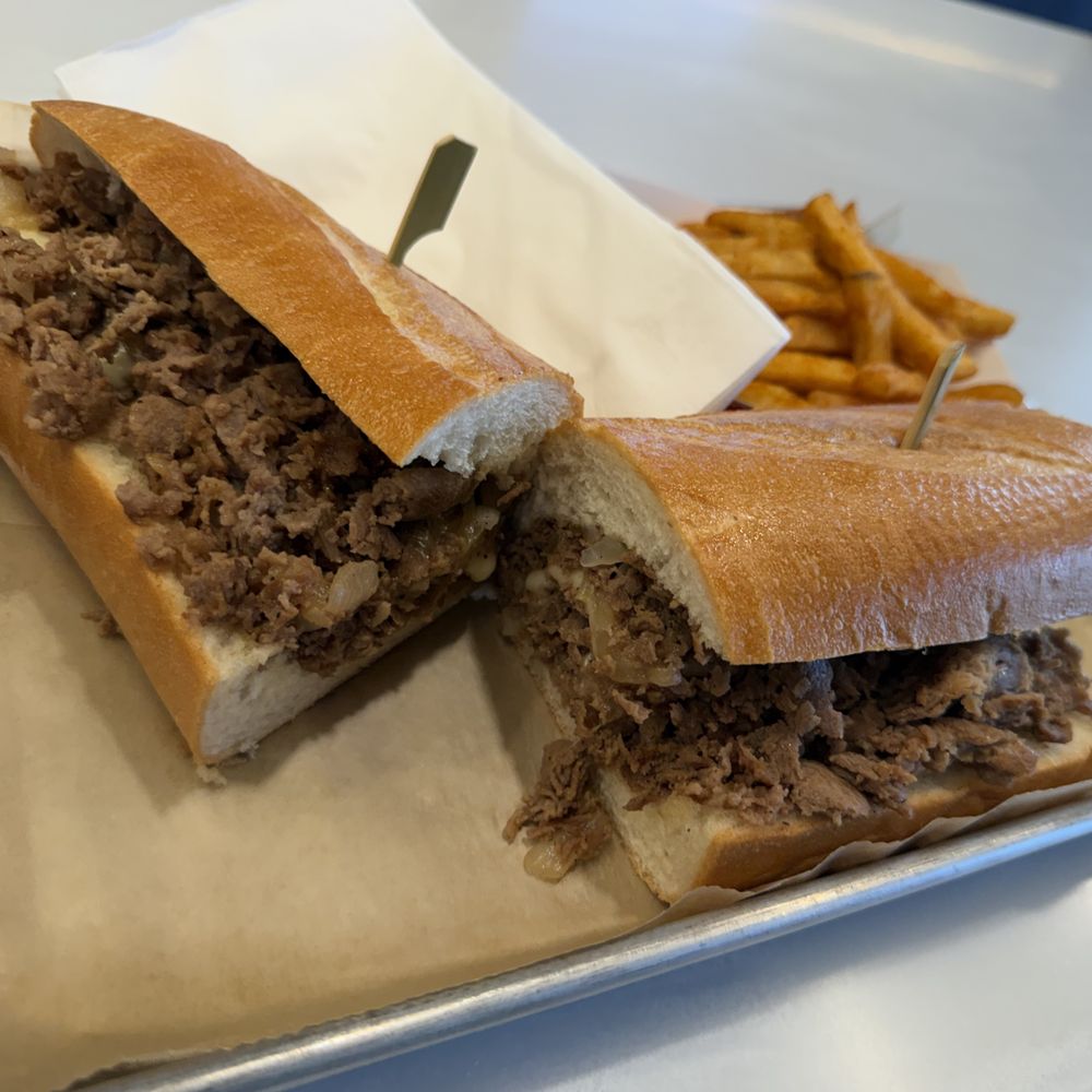 Cheesesteak and fries Cheesesteak and fries