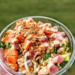 BYO salad bowl with ahi tuna, spicy salmon, toppings, and Sriracha aioli BYO salad bowl with ahi tuna, spicy salmon, toppings, and Sriracha aioli