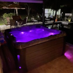 Unique Pools Spas & Billiards - Spa at night