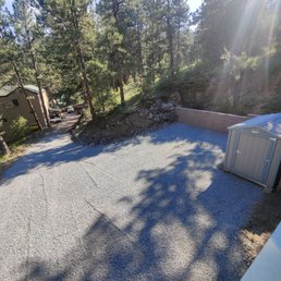 Matt built a new retaining wall for us and applied road base and gravel to improve our driveway.