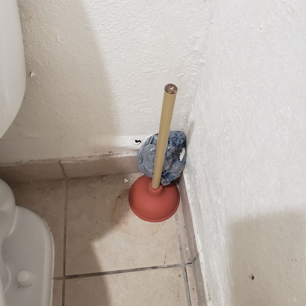 Motel 6 - Bathroom, hole in wall and bubbled paint - Hotels Near Me - Natchitoches, Louisiana