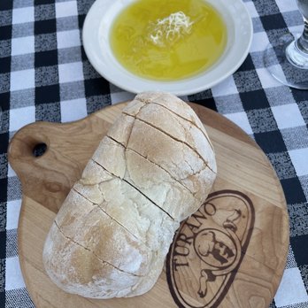 Cafe Calamari - Warm bread and olive oil - Italian Near Me - Williams Bay, Wisconsin Cafe Calamari - Warm bread and olive oil - Italian Near Me - Williams Bay, Wisconsin