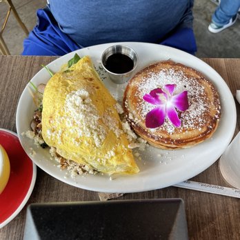 Bistro Cafe - Lamb omelette with pancakes - Breakfast & Brunch Near Me - Miami, Florida Bistro Cafe - Lamb omelette with pancakes - Breakfast & Brunch Near Me - Miami, Florida