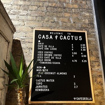 Casa Cactus - a menu on a brick wall - Coffee & Tea Near Me - Chicago, Illinois