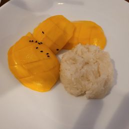 Delicious mango dessert my date suggested that she knew was good and wanted to split Delicious mango dessert my date suggested that she knew was good and wanted to split