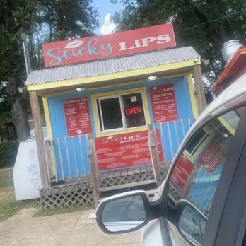 Sticky Lips - a car parked in front of a store - Shaved Snow Near Me - Mendenhall, Mississippi Sticky Lips - a car parked in front of a store - Shaved Snow Near Me - Mendenhall, Mississippi