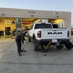 J&T Tire Pros - Getting my spare put on.