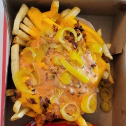 Animal-Style Fries w/ extra cheese and yellow chili peppers. Animal-Style Fries w/ extra cheese and yellow chili peppers.