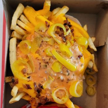 In-N-Out Burger - Animal-Style Fries w/ extra cheese and yellow chili peppers. - Burgers Near Me - Westminster, California In-N-Out Burger - Animal-Style Fries w/ extra cheese and yellow chili peppers. - Burgers Near Me - Westminster, California