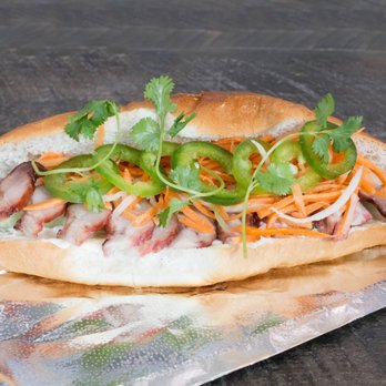 Saigon Sandwich Company - Loaded roast pork Bahn Mi sandwich - Vietnamese Near Me - Saginaw, Michigan Saigon Sandwich Company - Loaded roast pork Bahn Mi sandwich - Vietnamese Near Me - Saginaw, Michigan