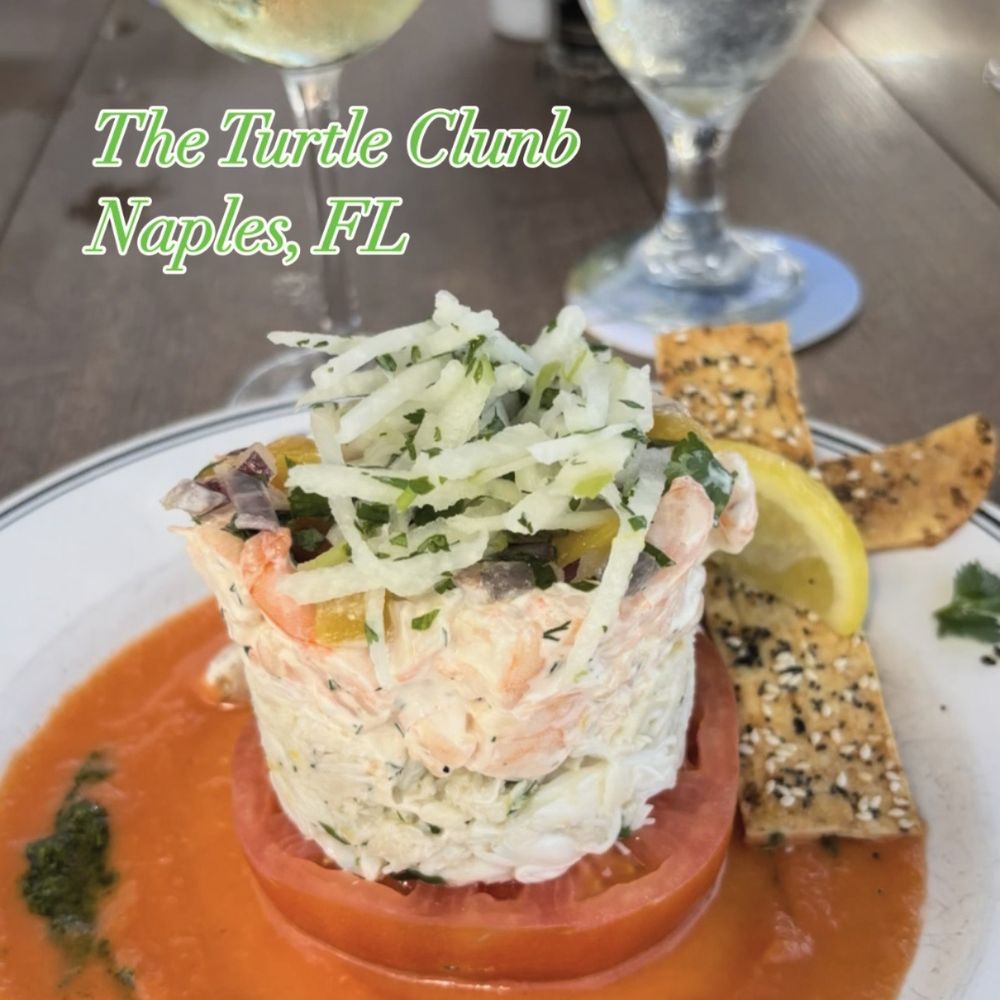 Turtle Club Restaurant - Crab and shrimp tower on top of a fresh tomato. - Seafood Near Me - Naples, Florida Turtle Club Restaurant - Crab and shrimp tower on top of a fresh tomato. - Seafood Near Me - Naples, Florida