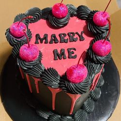 Cakes By Jess - This is a heart-shaped cream cheese icing carrot cake with sparkly cherries