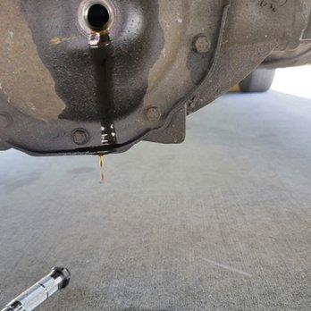 Jiffy Lube - Differential actually overflowing with oil, when Jiffy Lube claimed it was dangerously empty, trying to upsell a refill for $99 plus tax - Oil Change Stations Near Me - Miami, Florida Jiffy Lube - Differential actually overflowing with oil, when Jiffy Lube claimed it was dangerously empty, trying to upsell a refill for $99 plus tax - Oil Change Stations Near Me - Miami, Florida