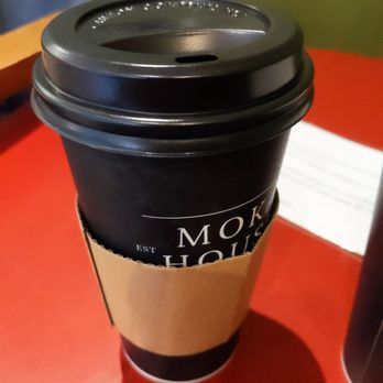 Moka House Coffee - a coffee cup on a table - Coffee & Tea Near Me - Victoria, British Columbia