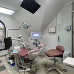 Cosmo Dental Centre - Patient exam room at Cosmo Dental Centre.