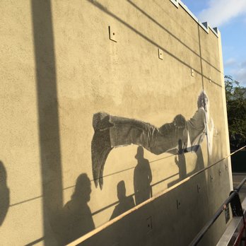 Pow! Wow! Long Beach - A flying Jim Morrison - Public Art Near Me - Long Beach, California