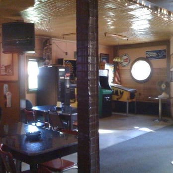 Greka’s Tavern - the interior of a restaurant - Dive Bars Near Me - Rogers City, Michigan Greka’s Tavern - the interior of a restaurant - Dive Bars Near Me - Rogers City, Michigan