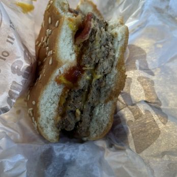 Burger King - a half eaten sandwich in a wrapper - Burgers Near Me - Vinton, Louisiana Burger King - a half eaten sandwich in a wrapper - Burgers Near Me - Vinton, Louisiana