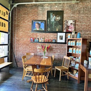 Ten Ton Coffee - a table and chairs in front of a brick wall - Coffee & Tea Near Me - Waitsburg, Washington Ten Ton Coffee - a table and chairs in front of a brick wall - Coffee & Tea Near Me - Waitsburg, Washington