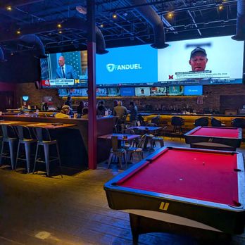 Kings Dining & Entertainment - Restaurant side with booths, a bar and pool tables. No ping pong sadly! - Bowling Near Me - Franklin, Tennessee