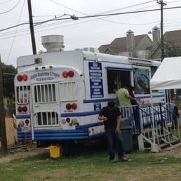 a man loading a food truck