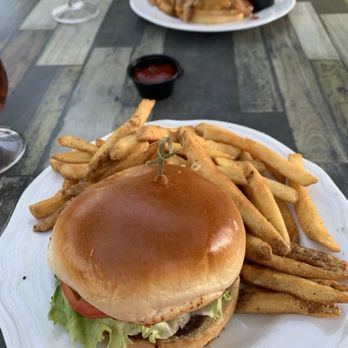 Gigglewaters - Burger with tomatoes, lettuce, onion along with French fries. - American Near Me - Safety Harbor, Florida