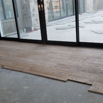 ABC Flooring - an empty room with a sliding glass door - Flooring Near Me ABC Flooring - an empty room with a sliding glass door - Flooring Near Me