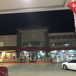 Randy's Exxon - Store front of the convenience store at night