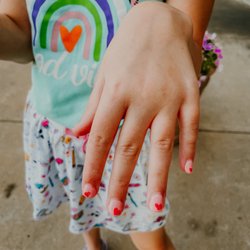 Nail Spa - Her nails. He said he couldn't do two hearts.