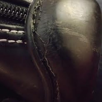 Ann Arbor Shoe Repair - They charged me for hand stitching, and this was clearly shoved into a machine. Yes, that's a large animal hair woven right into the repair - Shoe Repair Near Me - Ann Arbor, Michigan Ann Arbor Shoe Repair - They charged me for hand stitching, and this was clearly shoved into a machine. Yes, that's a large animal hair woven right into the repair - Shoe Repair Near Me - Ann Arbor, Michigan