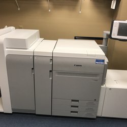 Express Copy Print & Ship - High speed color printer.