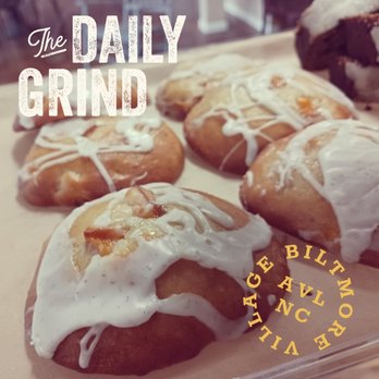 The Daily Grind - a tray of doughnuts with icing - Coffee & Tea Near Me - Asheville, North Carolina The Daily Grind - a tray of doughnuts with icing - Coffee & Tea Near Me - Asheville, North Carolina