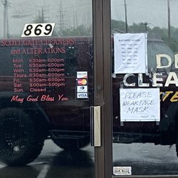 Scottgate Cleaners & Alterations - Lol , 2 sets of hours . How about covering one set up ? Nah , let the customers figure it out for themselves when they get here .