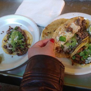 Hamburgesa Loca Truck - a plate of tacos and a bottle of water - Food Trucks Near Me Hamburgesa Loca Truck - a plate of tacos and a bottle of water - Food Trucks Near Me