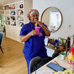 Timeless Care Homes - One of our nurse friends enjoying our Luau!