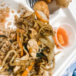 Tien's Place Oriental Dining - Half eaten glacier chicken combo
