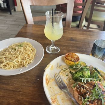 The Bistro at Blanco River - Blackened salmon, pasta and white wine sangria. The salmon is cooked to perfection...it's all amazing!! Highly recommend!! - American Near Me - Blanco, Texas