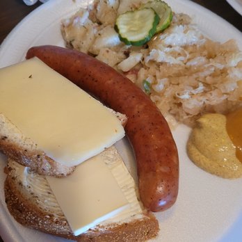 George's Market - Hot plate- with warm German potato salad, kraut, buttered rye bread with Havarti cheese, mustard, pickles, and the sausage of your choice. - Delis Near Me - Calimesa, California