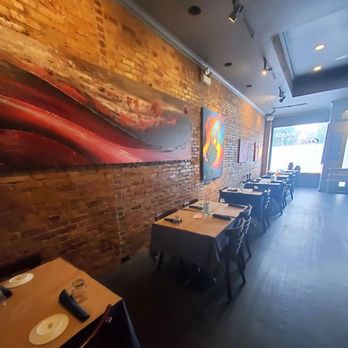 La Encantada - a dining room with tables and chairs - Mexican Near Me - Chicago, Illinois